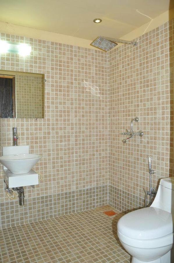 Rock Water Resort Morjim Habitación foto